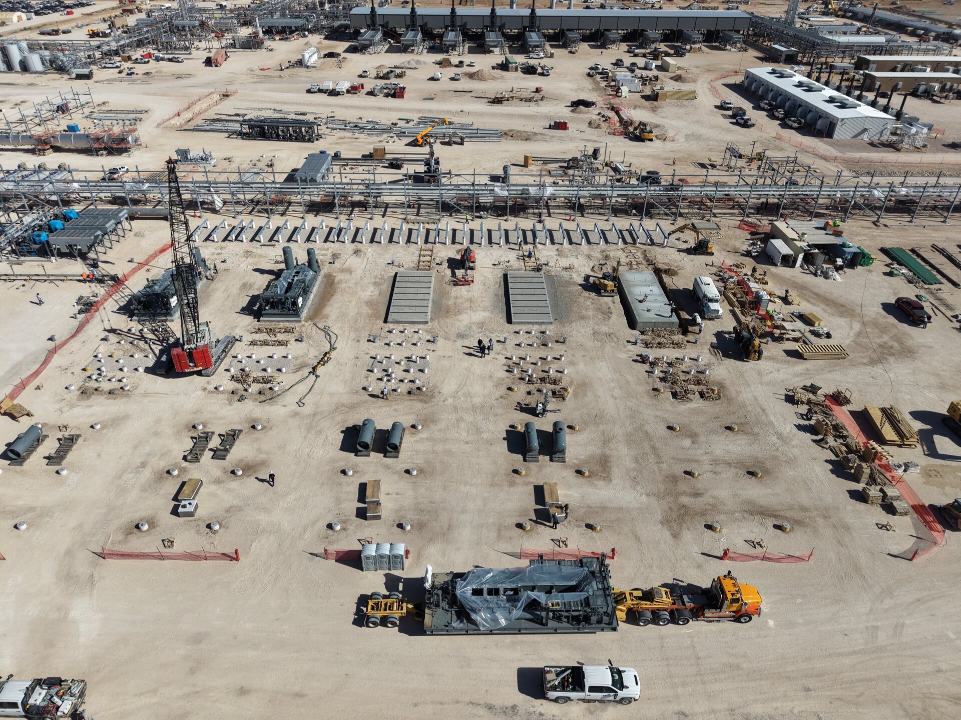 Aerial view of an industrial construction site and surrounding right of way