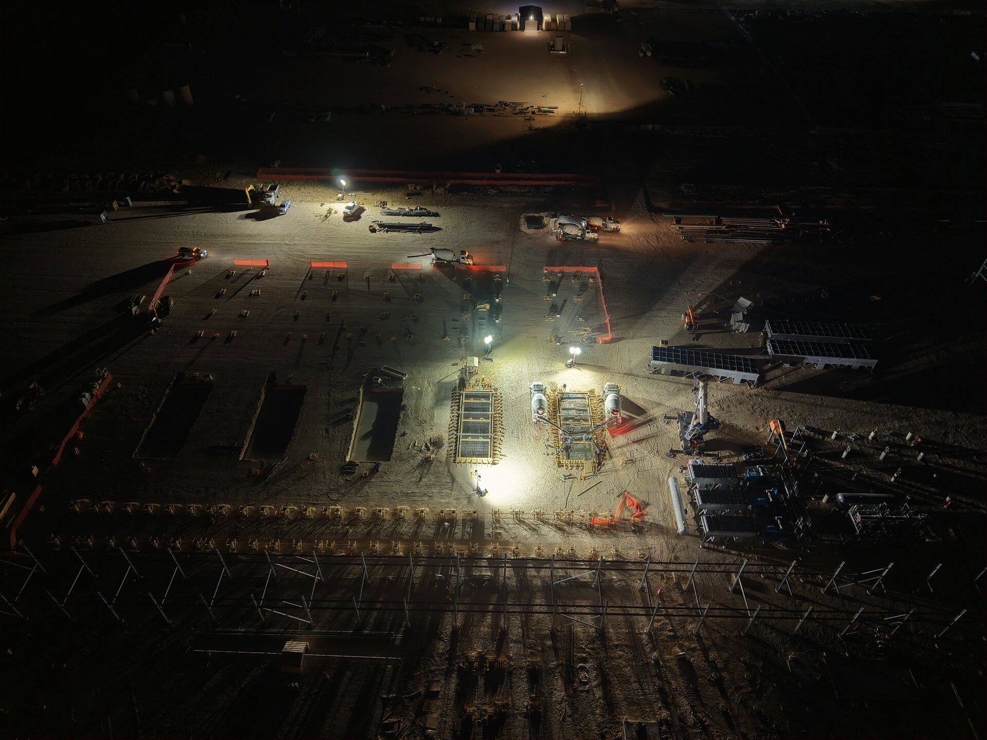 Aerial view of illuminated industrial foundation work